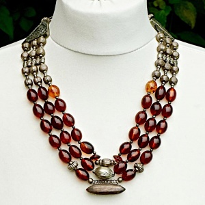 Silver Tone and Triple Strand Polished Cognac Amber Bead Necklace