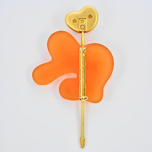 Nina Ricci Gold Plated and Abstract Orange Plastic Brooch
