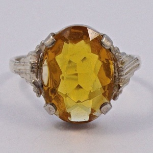 Art Deco Silver Tone Ring with an Oval Gold Glass Stone