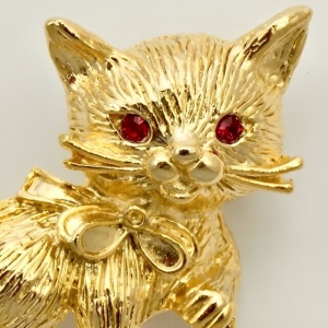 Gold Plated Cat Brooch with Red Crystal Eyes circa 1980s