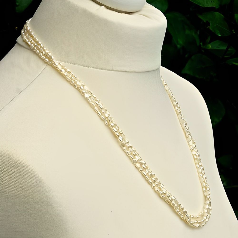 Three Strand Baroque Rice Pearl Necklace circa 1970s | Arabella Bianco