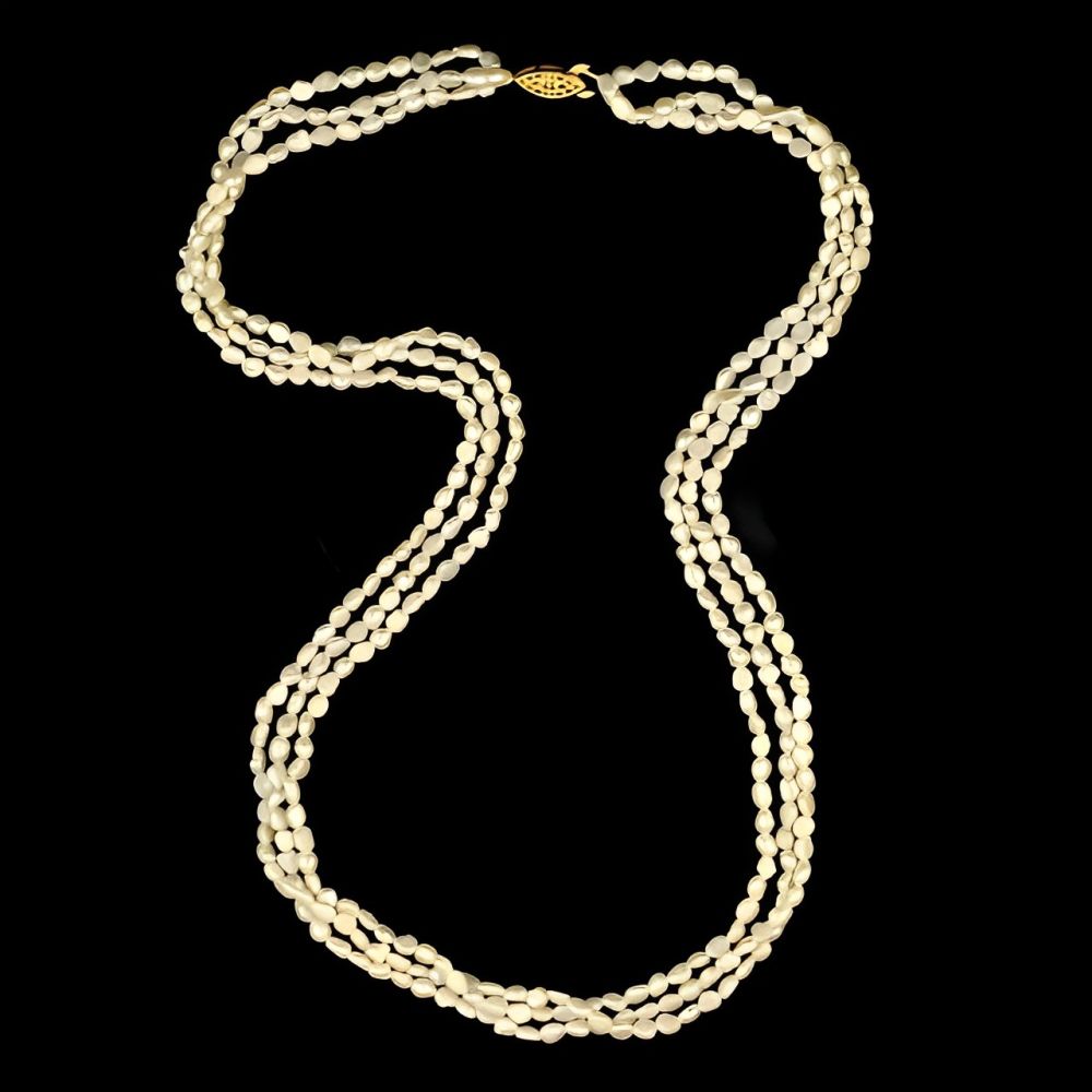 Three Strand Baroque Rice Pearl Necklace circa 1970s | Arabella Bianco