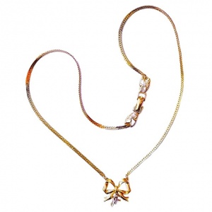 Nina Ricci Gold Tone Necklace with Bow Pendant